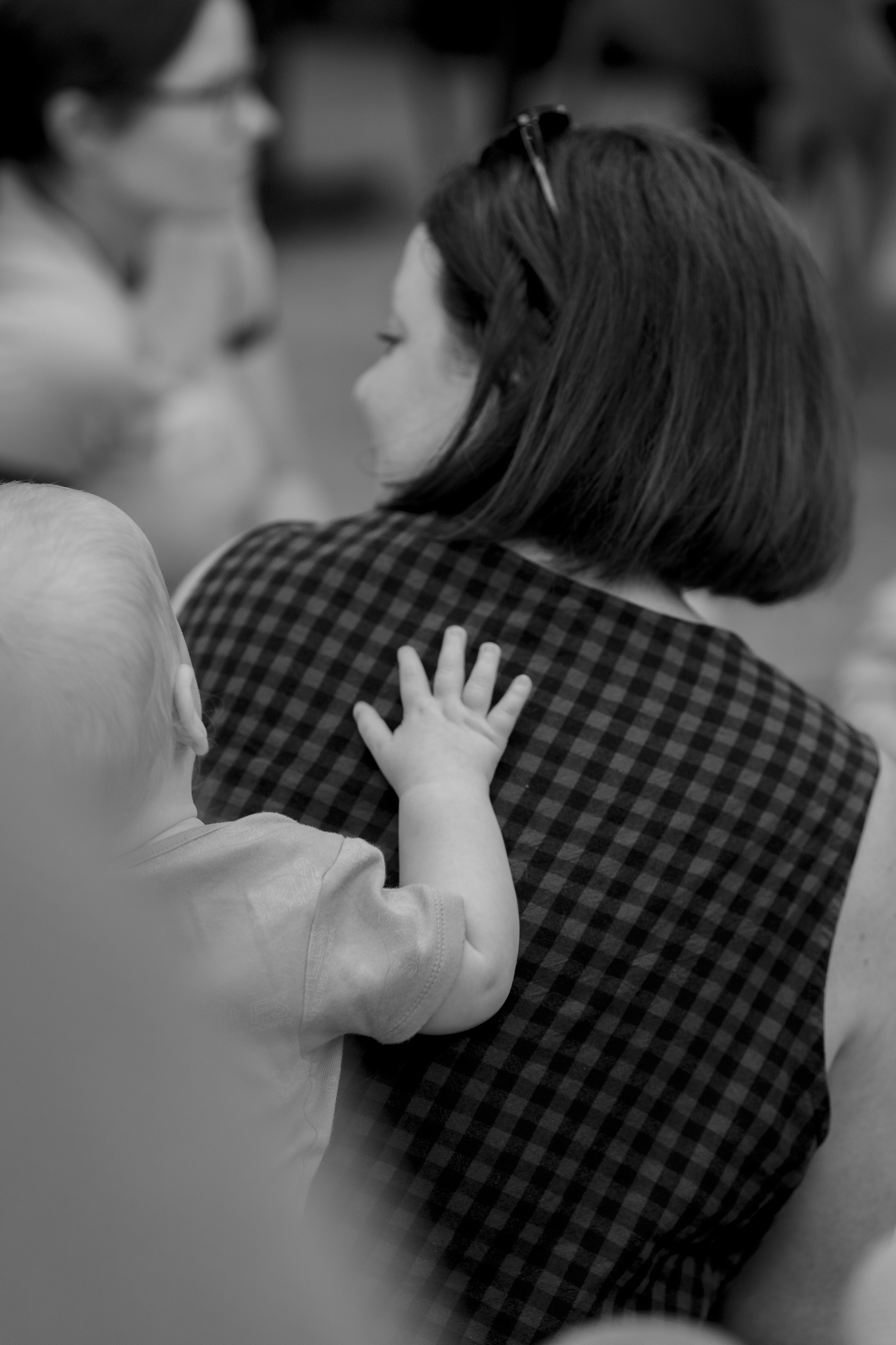 A mum with her baby preparing for her return to paid work